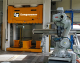 Robot automation presses